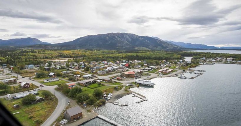 View of Atlin, BC from an airplane flying over the water. 