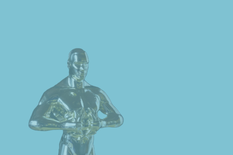 bronze human figure representing an Oscar award